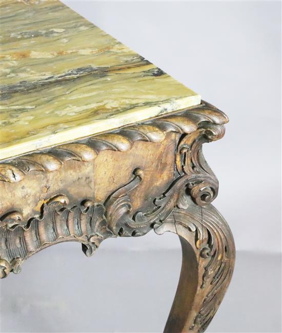 An impressive George II walnut and marble topped centre table, c.1740-50, W.5ft 4in. D.3ft 1.5in. H.2ft 10in.